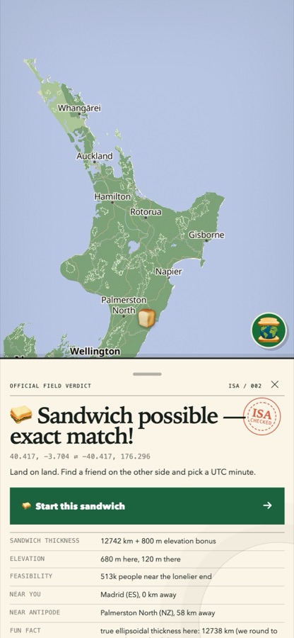 The Earth Sandwich map on a phone: New Zealand’s North Island above a verdict card for Madrid reading “Sandwich possible — exact match!”
